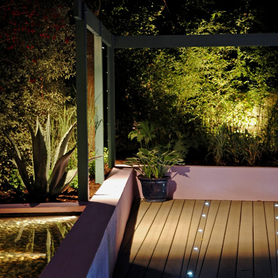 Water feature and garden lighting enhance views at night