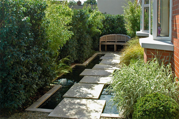 Contemporary use of water feature in a city garden 