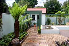 Contemporary garden design with raised water feature by Dublin garden designer Peter O’Brien.