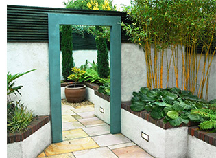 The Dublin garden designers also used mirror to increase space in the small shady courtyard.